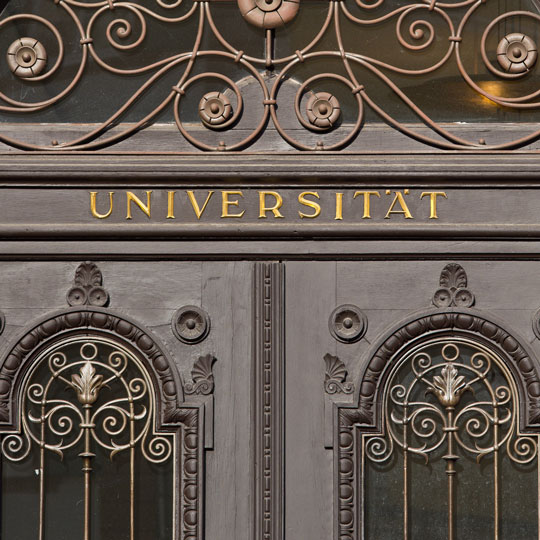 Close up photograph of a very old university building